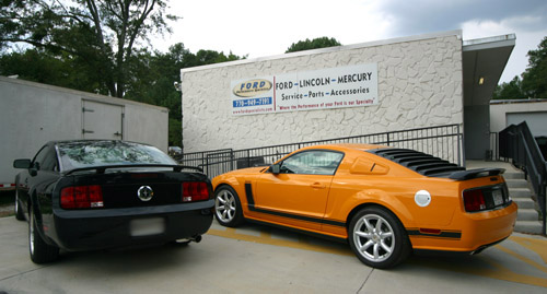2 Mustangs outside of Ford Performance Specialists Inc